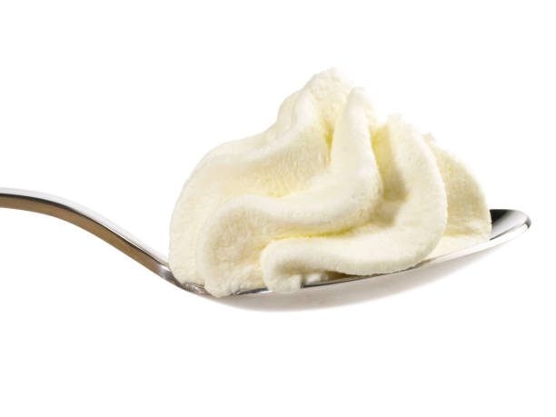Whipped Cream on a Spoon - White Background